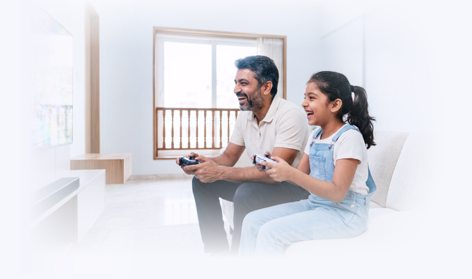 Father and Daughter playing videogame